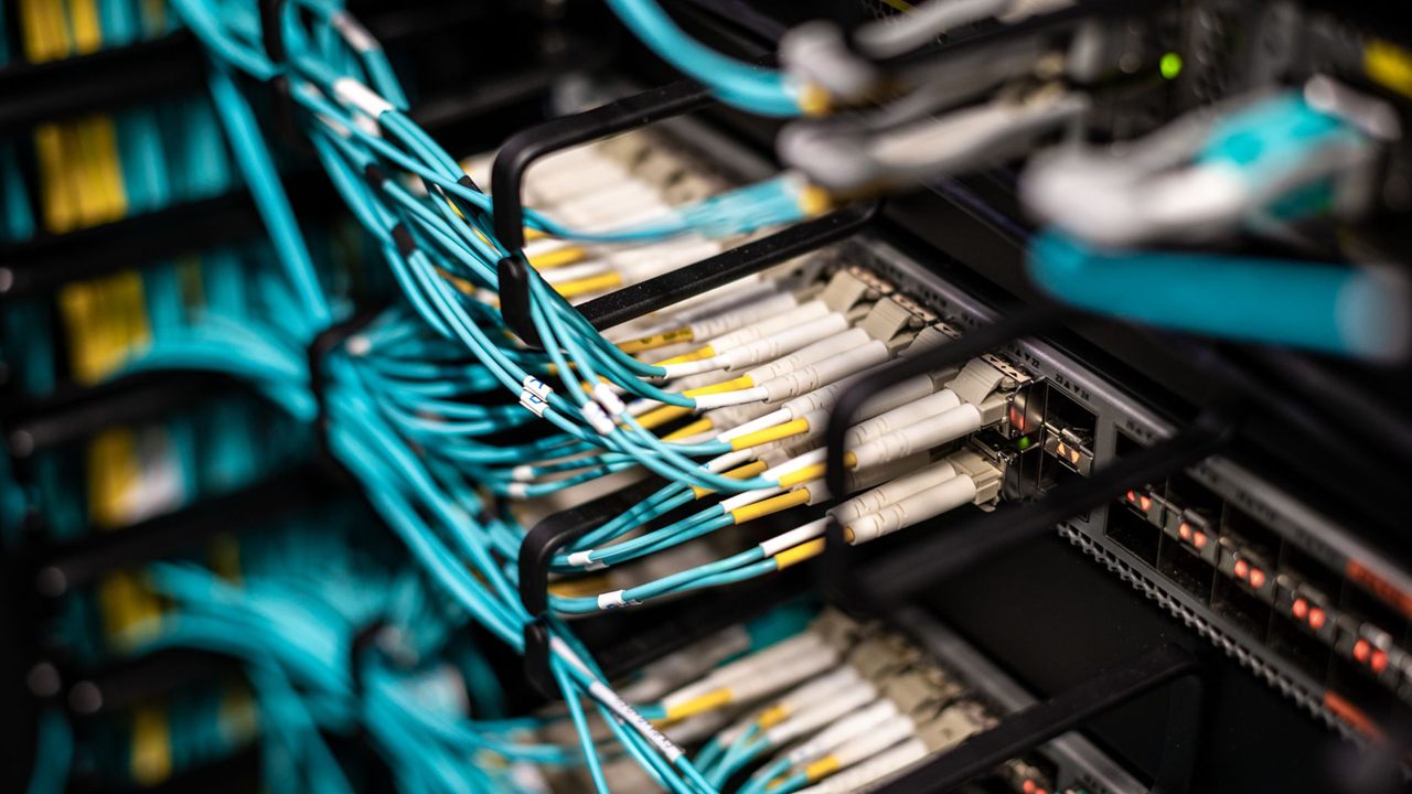 Patch cables dressed into an equipment rack in a closet