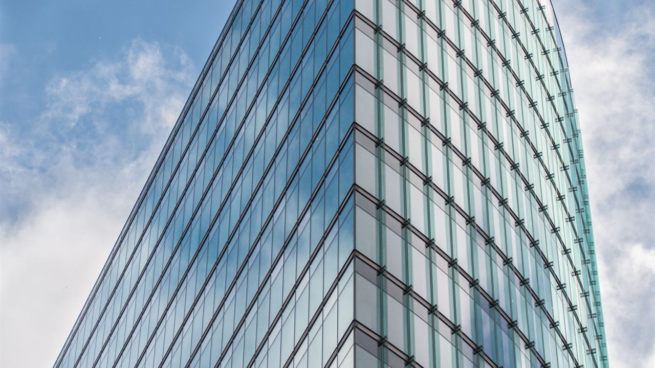 Glass office tower, a building type whose coated glass and steel weaken in-building cellular signal