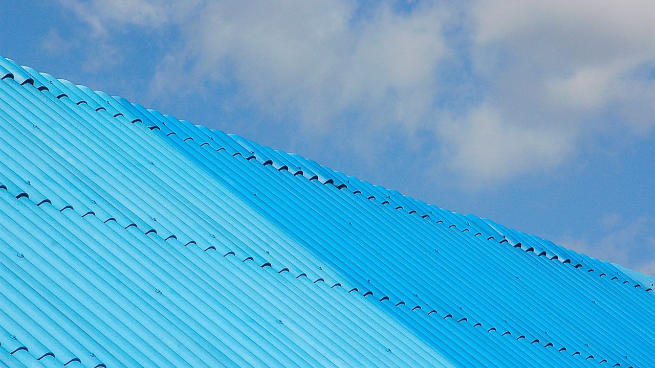 Metal roofing, which adds isolation between a booster outside antenna and the inside antenna