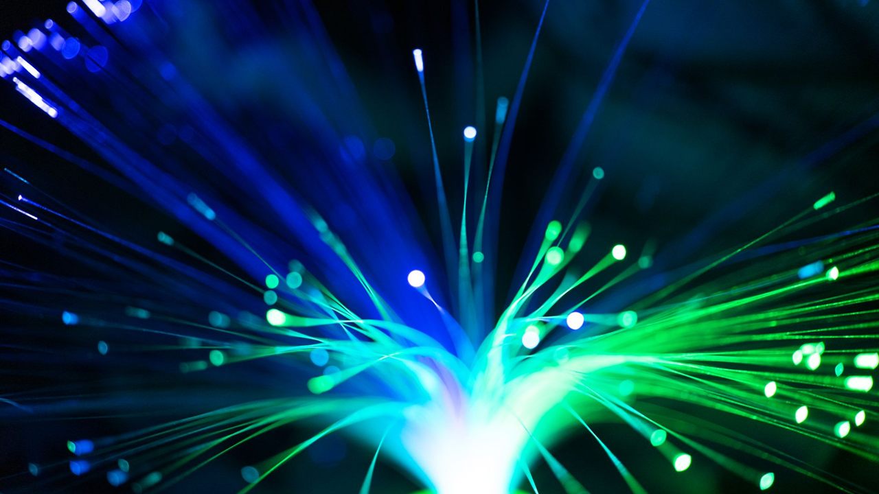 Glowing ends of thin optical fiber strands